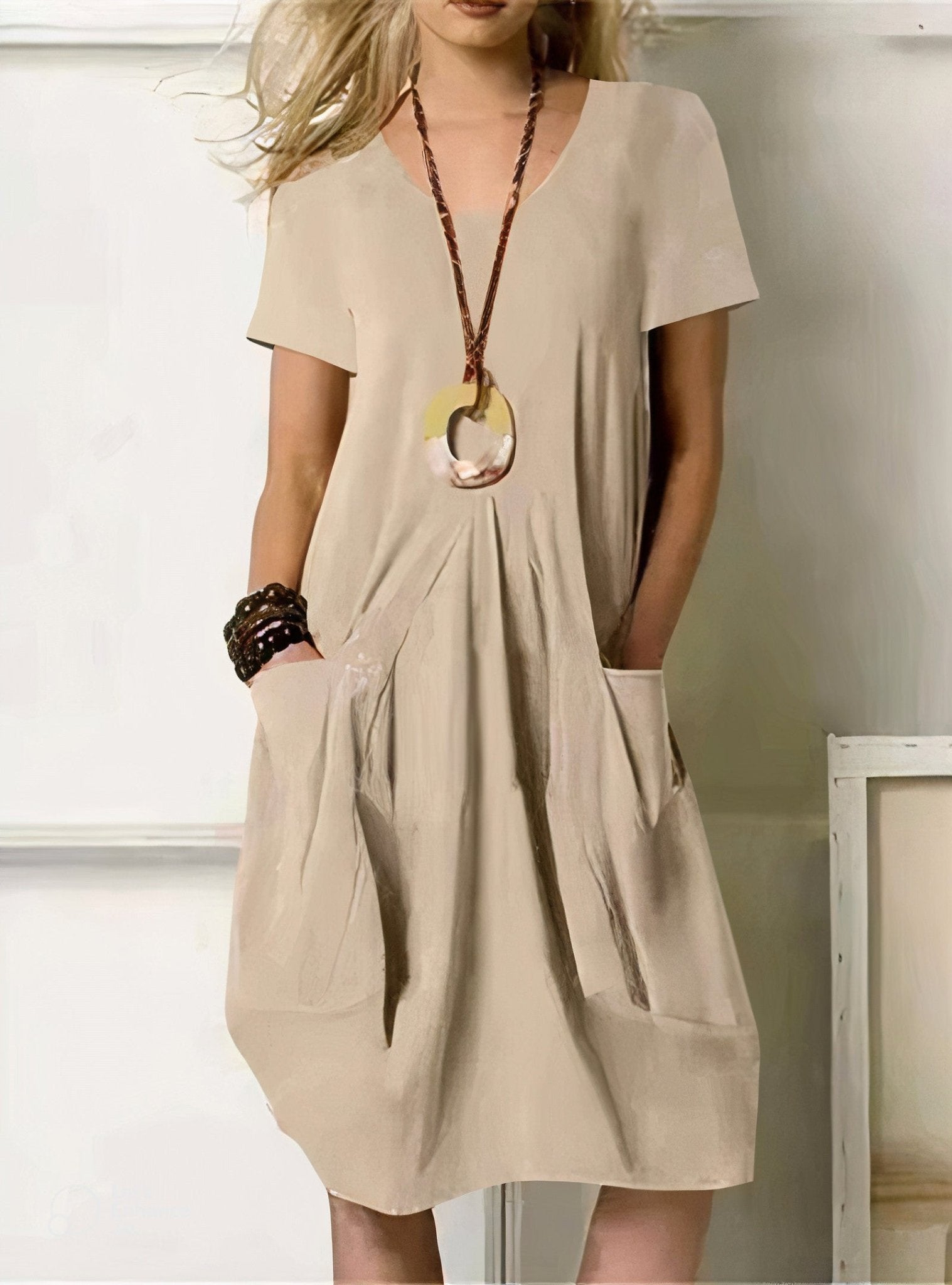 Kwani Easy Casual Flow Dress with round neck, classic sleeves and A-line silhouette
