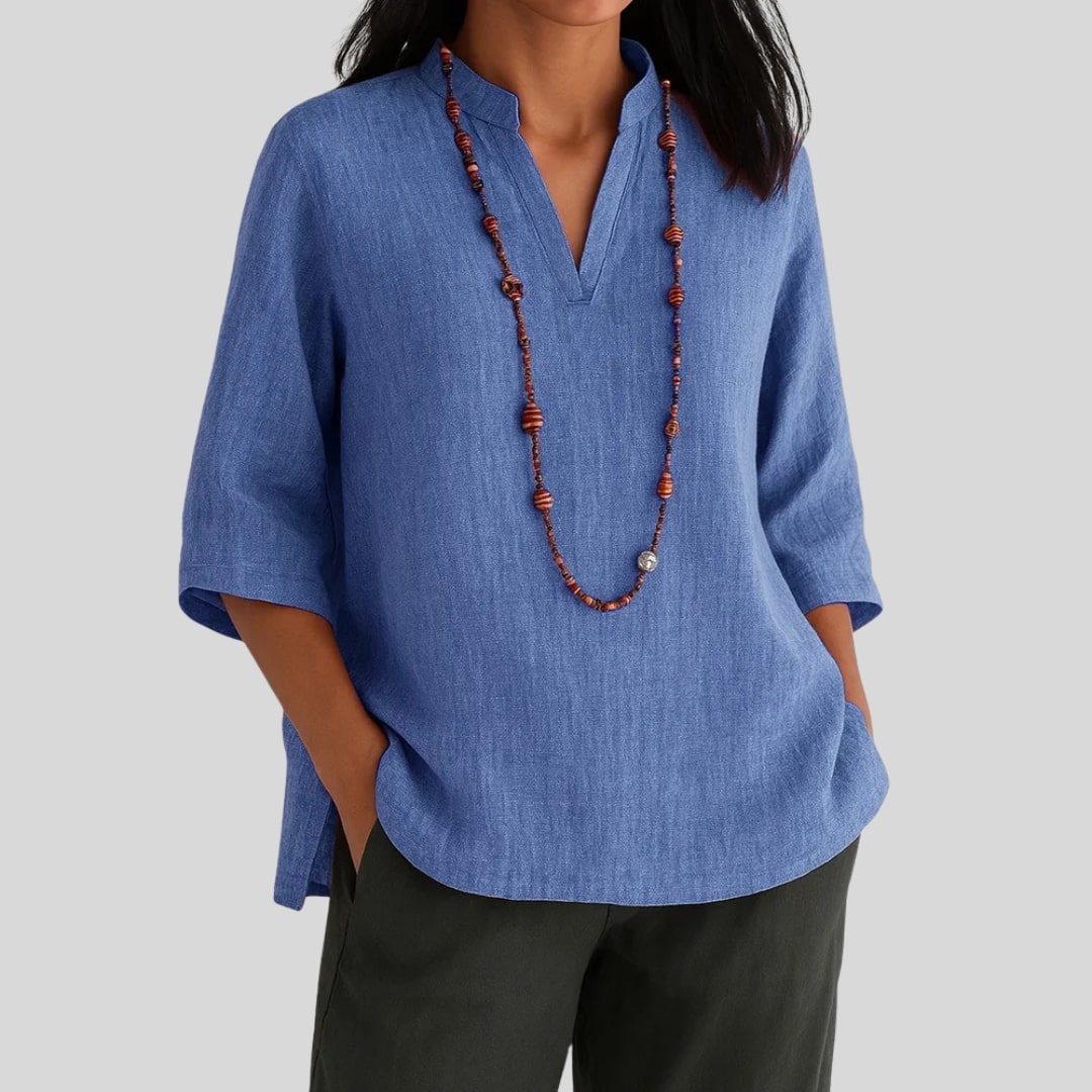 Elira chic everyday blouse with split V-neckline, three-quarter sleeves and peplum hem