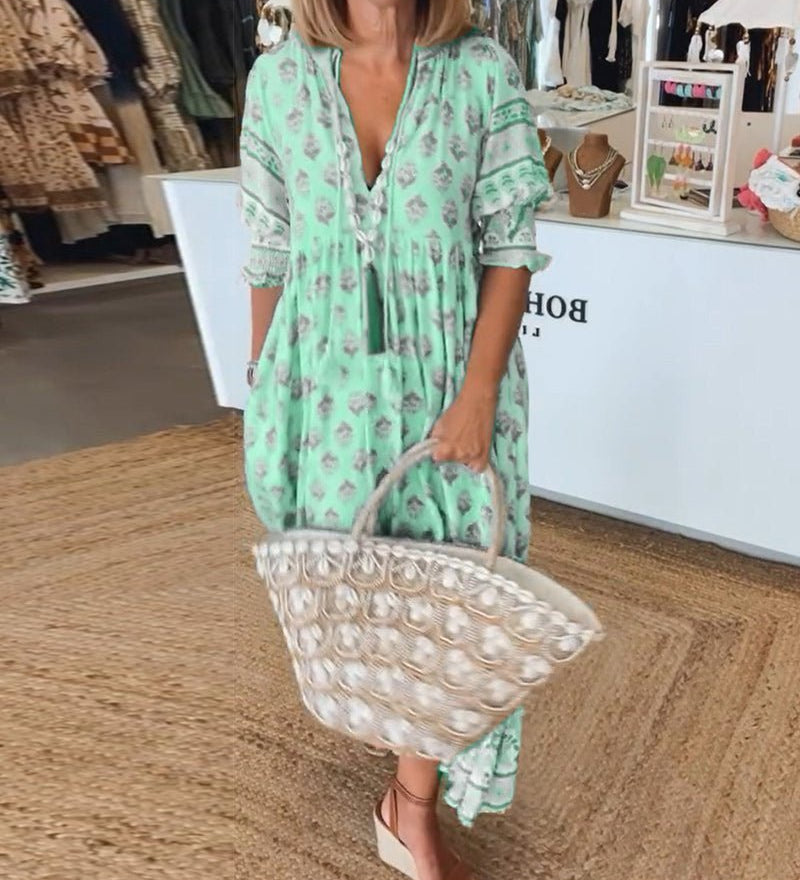 Mana floral v-neck dress shown in blue, green and pink