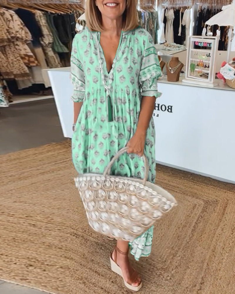 Mana floral v-neck dress shown in blue, green and pink