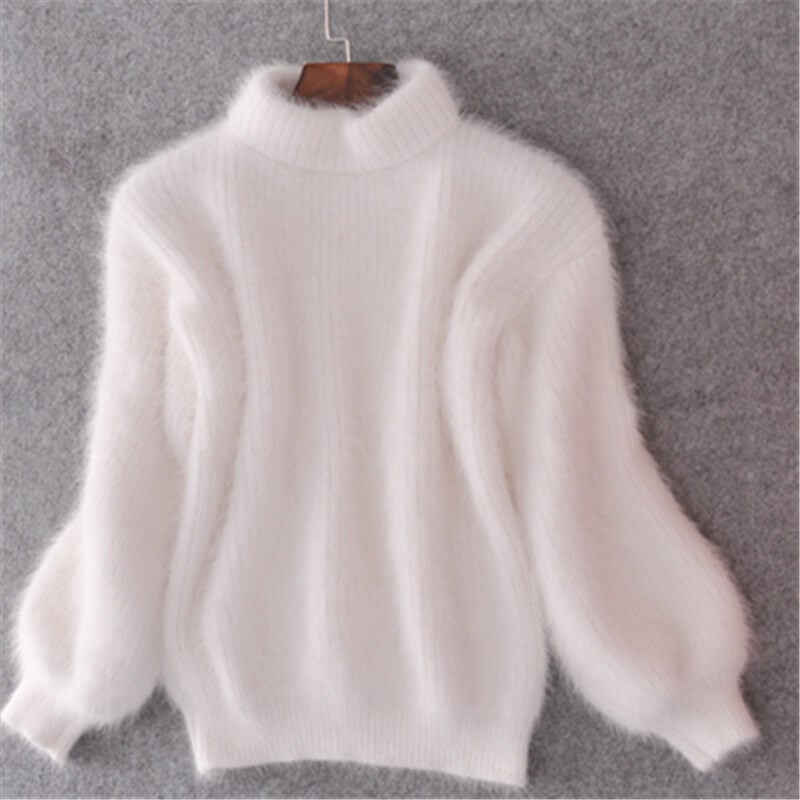 Lucia effortless soft sweater with a relaxed silhouette, shown in a neutral tone