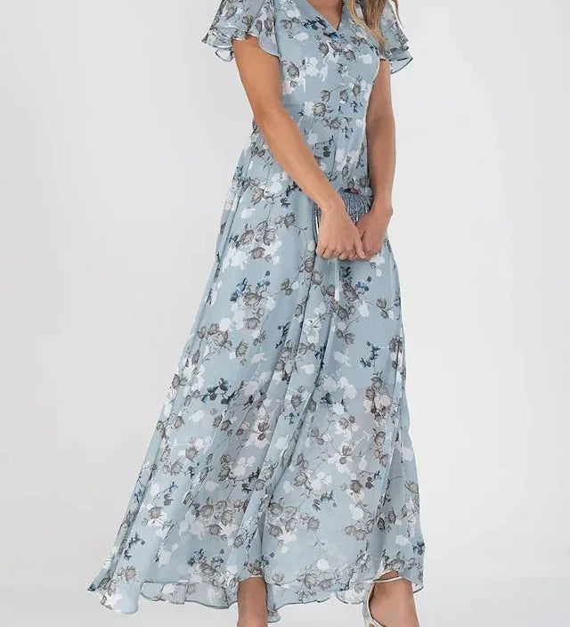 Zuri glamorous tummy-flattering dress in vibrant colour, styled for summer occasions