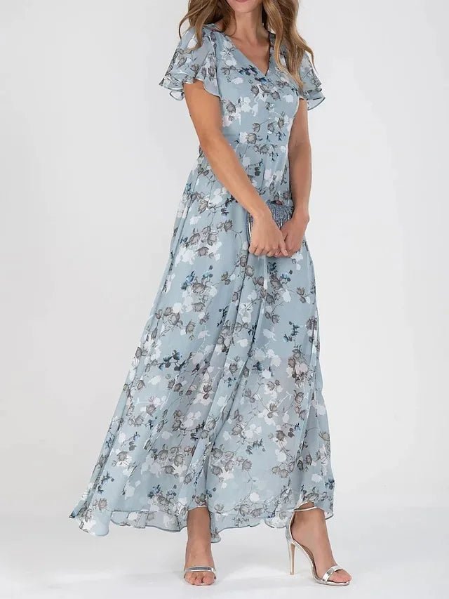 Zuri glamorous tummy-flattering dress in vibrant colour, styled for summer occasions