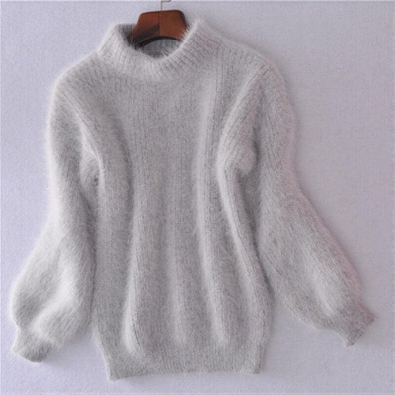 Lucia effortless soft sweater with a relaxed silhouette, shown in a neutral tone