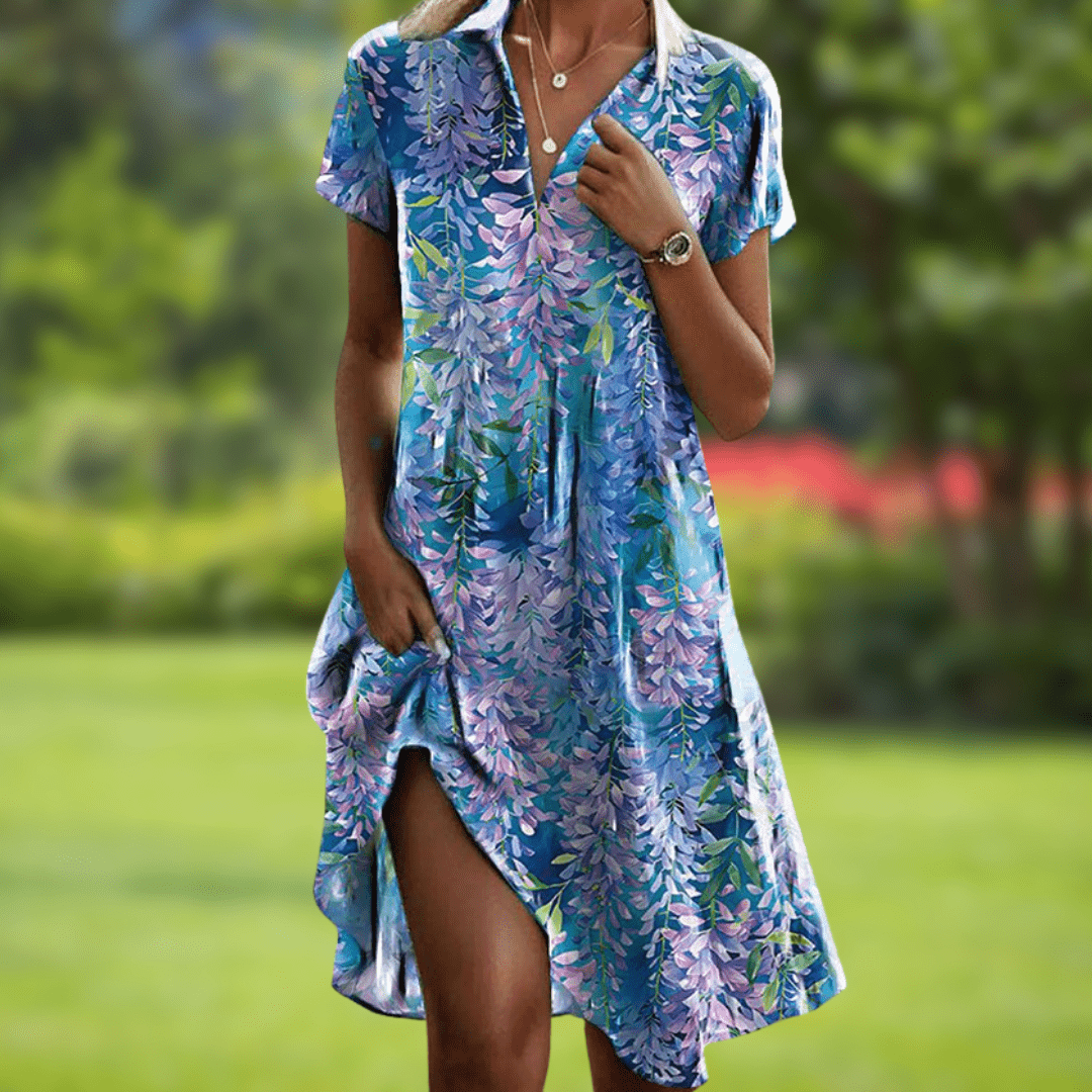 Firi chic elegant dress with vibrant floral print and flowy silhouette