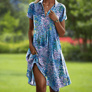 Firi chic elegant dress with vibrant floral print and flowy silhouette