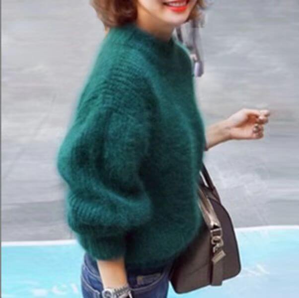 Lucia effortless soft sweater with a relaxed silhouette, shown in a neutral tone