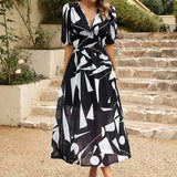 Allison floral midi dress with V-neckline, half sleeves and cinched waist