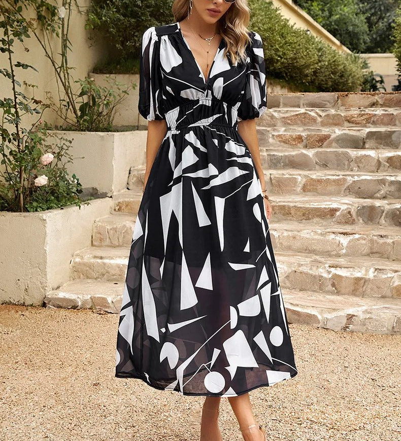 Allison floral midi dress with V-neckline, half sleeves and cinched waist