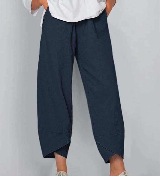 Avelina relaxed chic pants with a mid-rise waist and flowing silhouette, shown in neutral tones