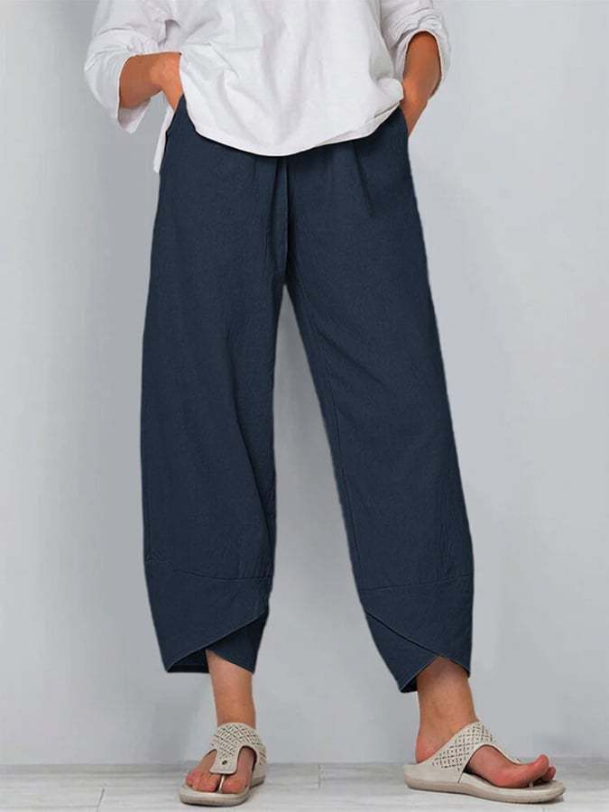 Avelina relaxed chic pants with a mid-rise waist and flowing silhouette, shown in neutral tones