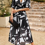 Allison floral midi dress with V-neckline, half sleeves and cinched waist