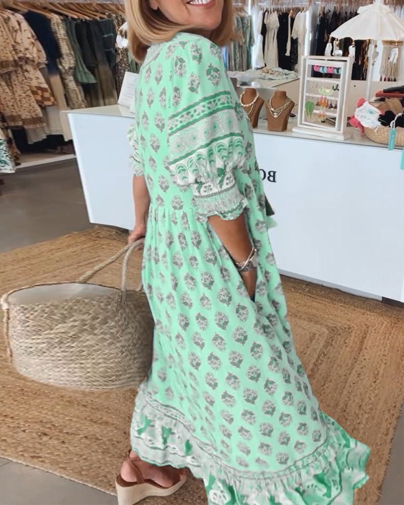 Mana floral v-neck dress shown in blue, green and pink