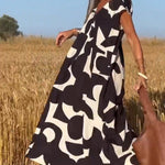 Amelia printed V-neck A-line dress in a flowing silhouette