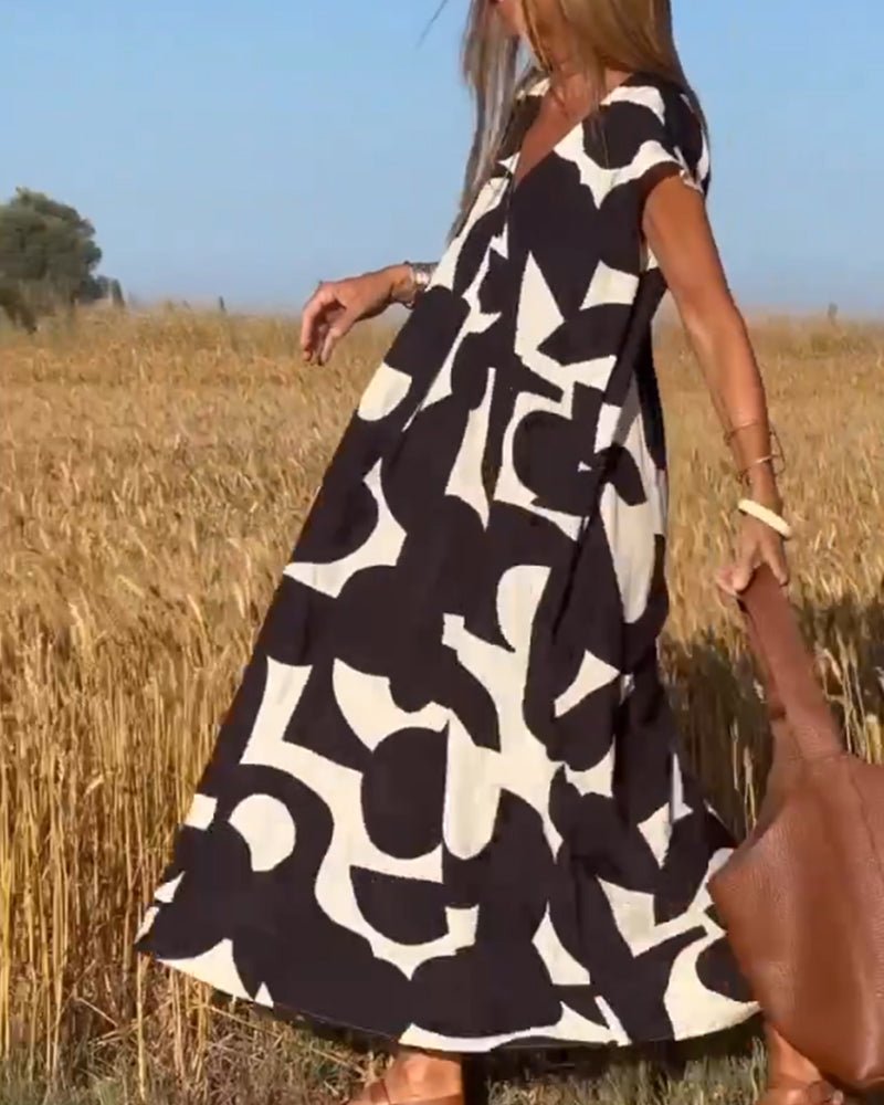 Amelia printed V-neck A-line dress in a flowing silhouette