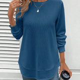 Ynes graceful long sleeve top with a classic round neck and regular fit