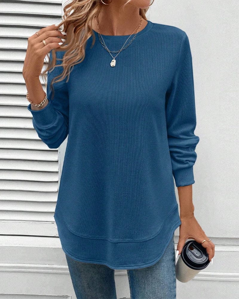 Ynes graceful long sleeve top with a classic round neck and regular fit