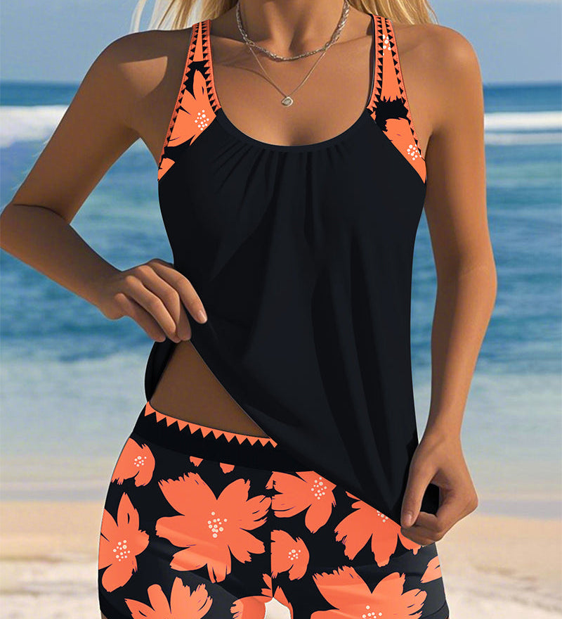 Edith sleeveless printed tankini with U-neck and open back in navy, orange and blue