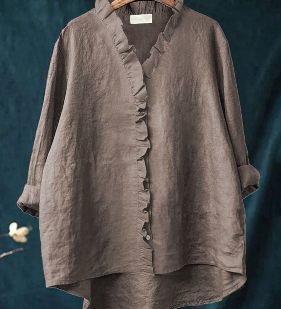 Rica retro ruffle blouse with collar and front placket ruffle detailing and long sleeves