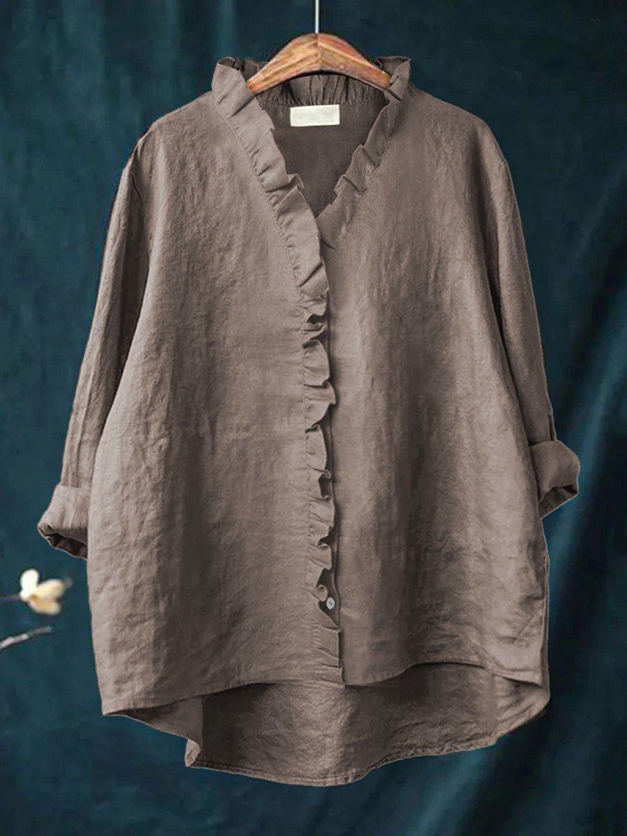 Rica retro ruffle blouse with collar and front placket ruffle detailing and long sleeves