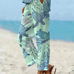 Sally relaxed casual pants with floral and turtle print in a light, easy-going colour
