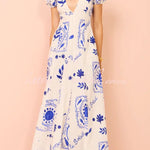 Avermy blue floral maxi dress with V-neckline and puff sleeves