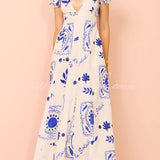 Avermy blue floral maxi dress with V-neckline and puff sleeves