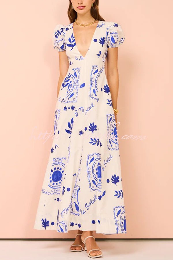 Avermy blue floral maxi dress with V-neckline and puff sleeves