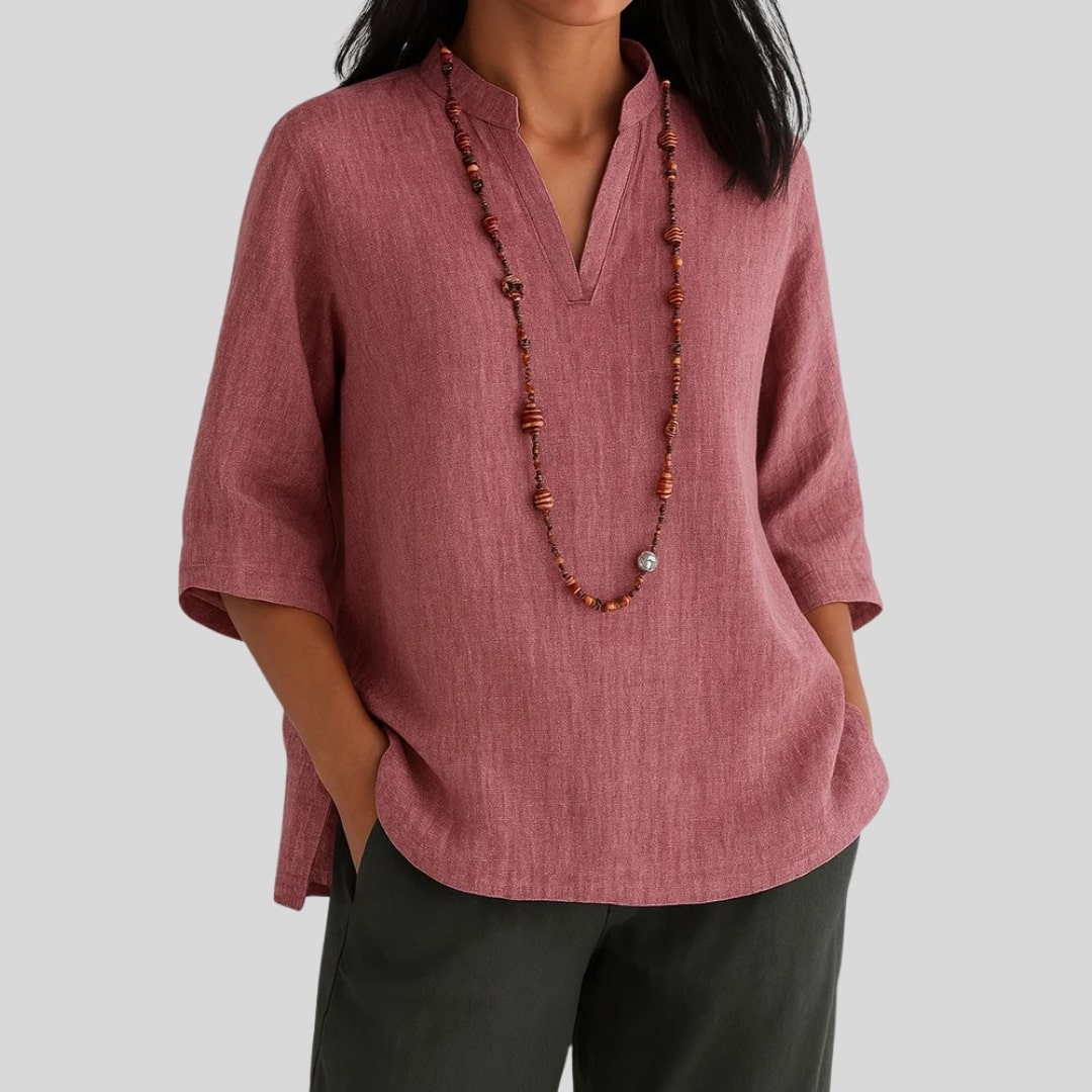 Elira chic everyday blouse with split V-neckline, three-quarter sleeves and peplum hem