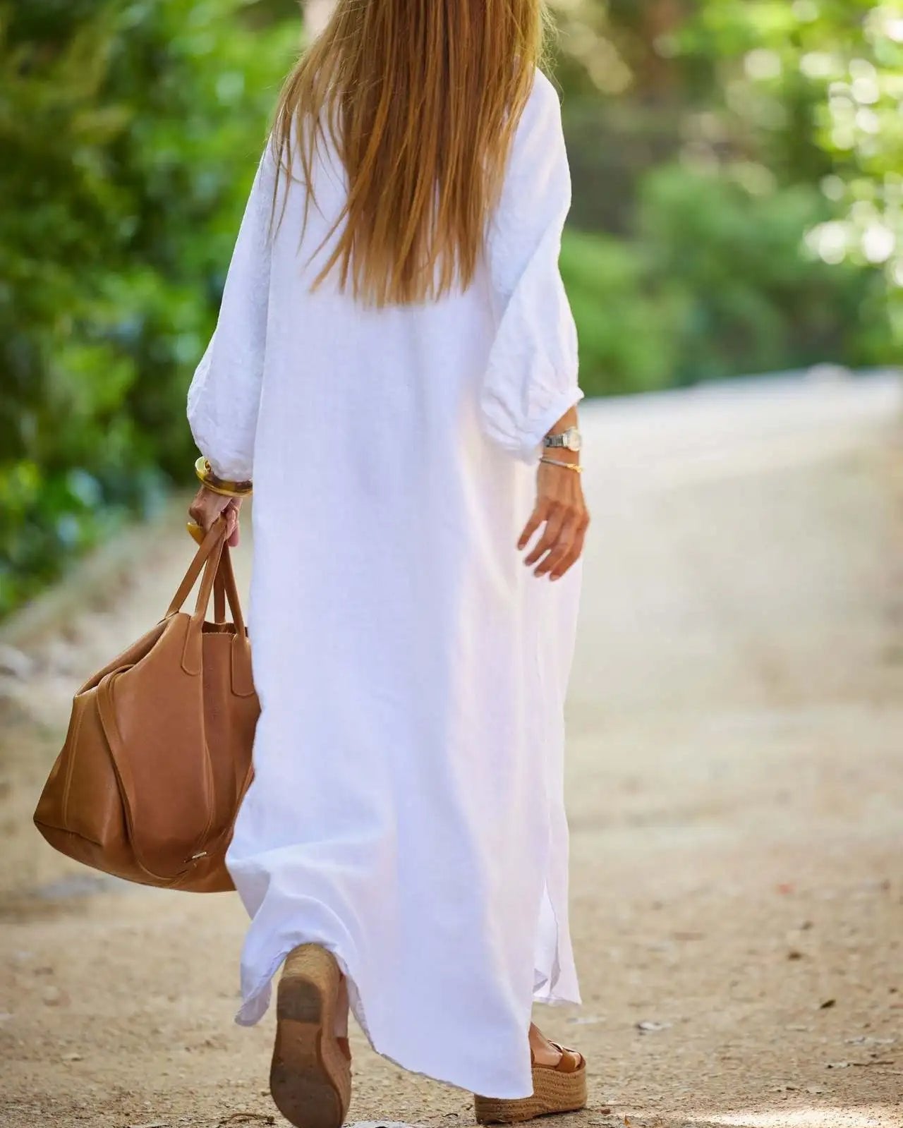 Elaina relaxed maxi dress with buttons and flowing skirt, shown in white