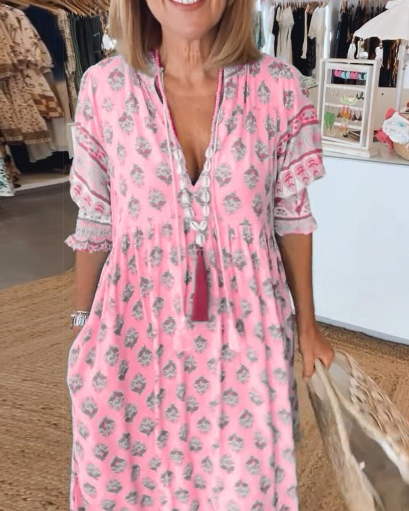 Mana floral v-neck dress shown in blue, green and pink