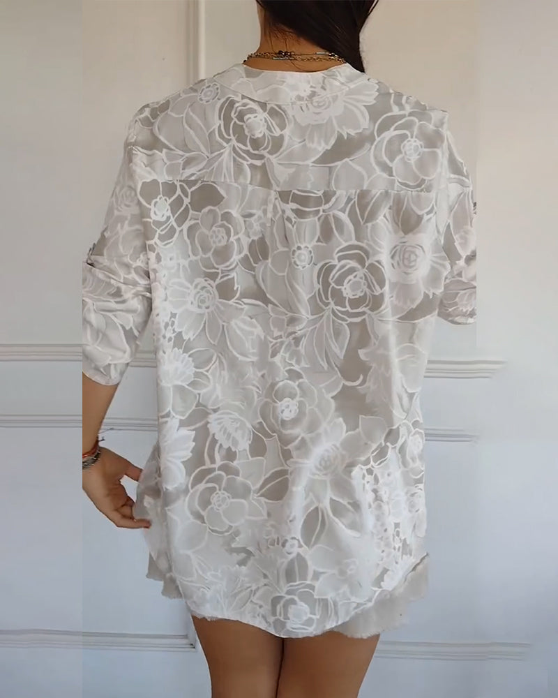 Sade floral print blouse with a relaxed, flowing silhouette in light blue