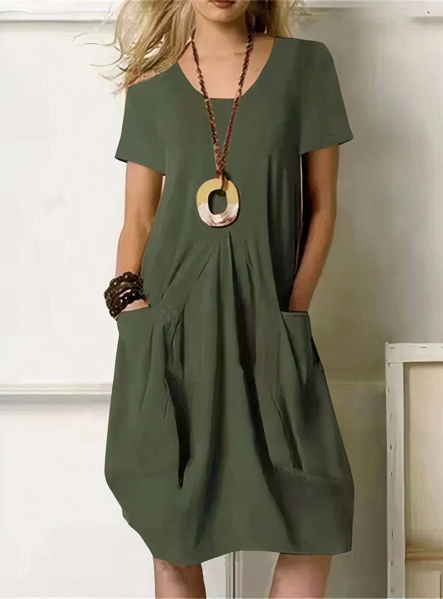 Kwani Easy Casual Flow Dress with round neck, classic sleeves and A-line silhouette