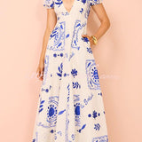 Avermy blue floral maxi dress with V-neckline and puff sleeves