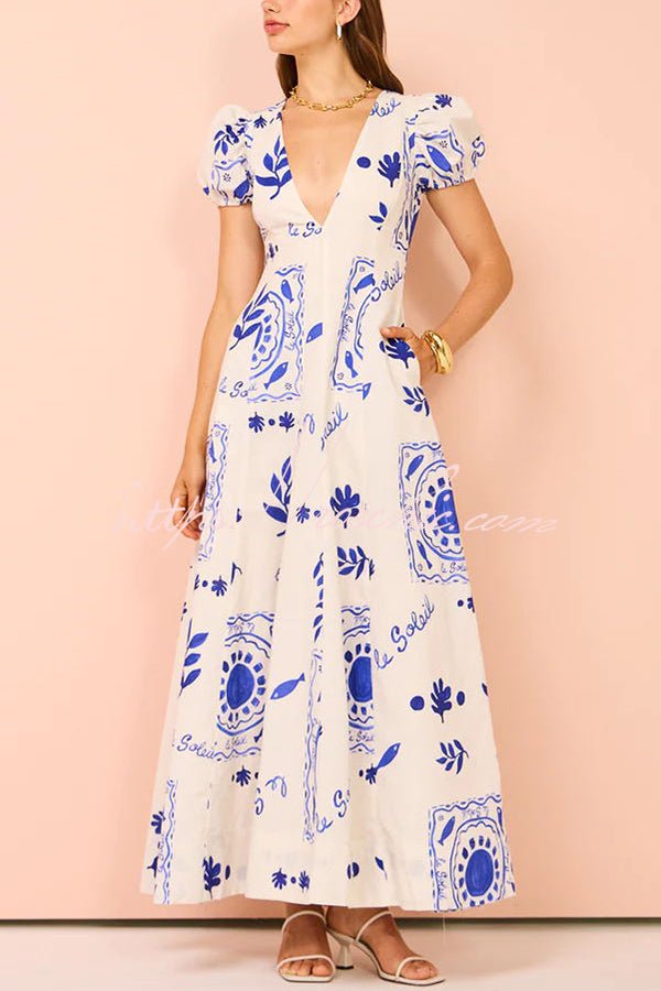 Avermy blue floral maxi dress with V-neckline and puff sleeves