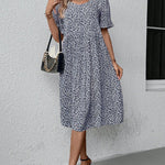 Anne elegant bloom midi dress in blue, red and green with a flattering feminine silhouette