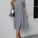 Anne elegant bloom midi dress in blue, red and green with a flattering feminine silhouette