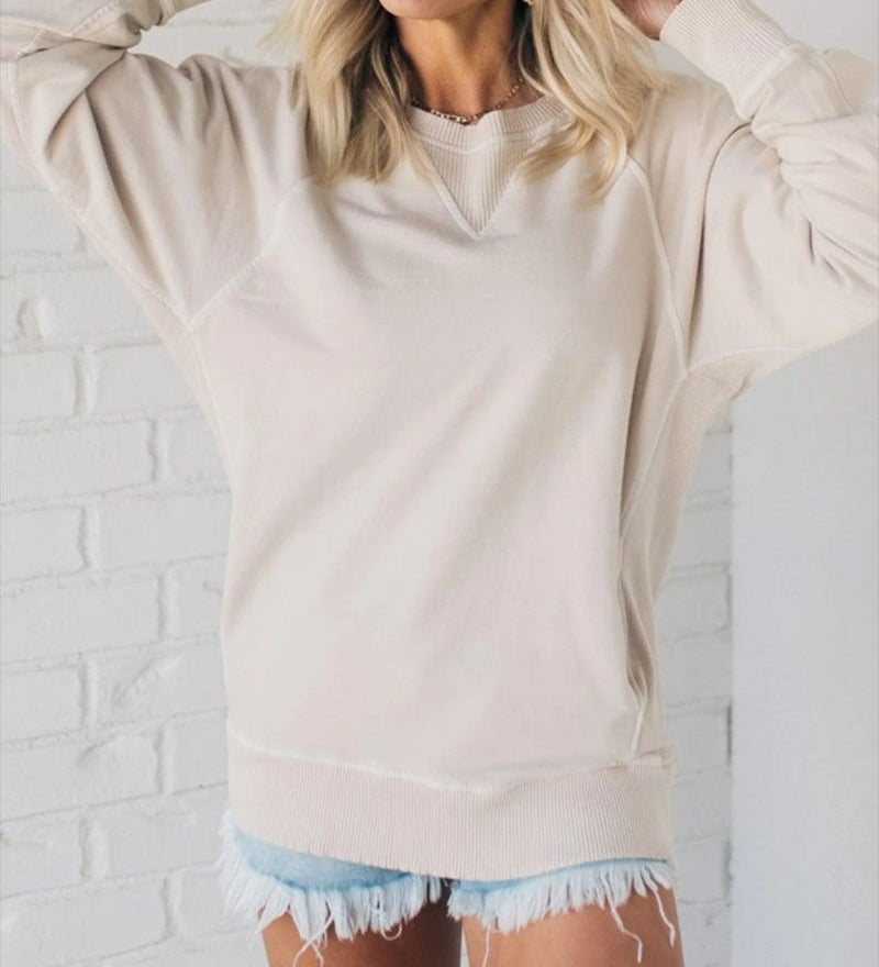 Flor ribbed pocket sweater with relaxed fit shown in a neutral tone