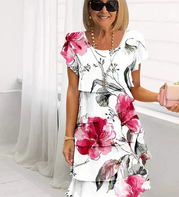 Jenna cascading floral tiered dress with flowing skirt in a soft feminine print