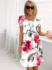 Jenna cascading floral tiered dress with flowing skirt in a soft feminine print