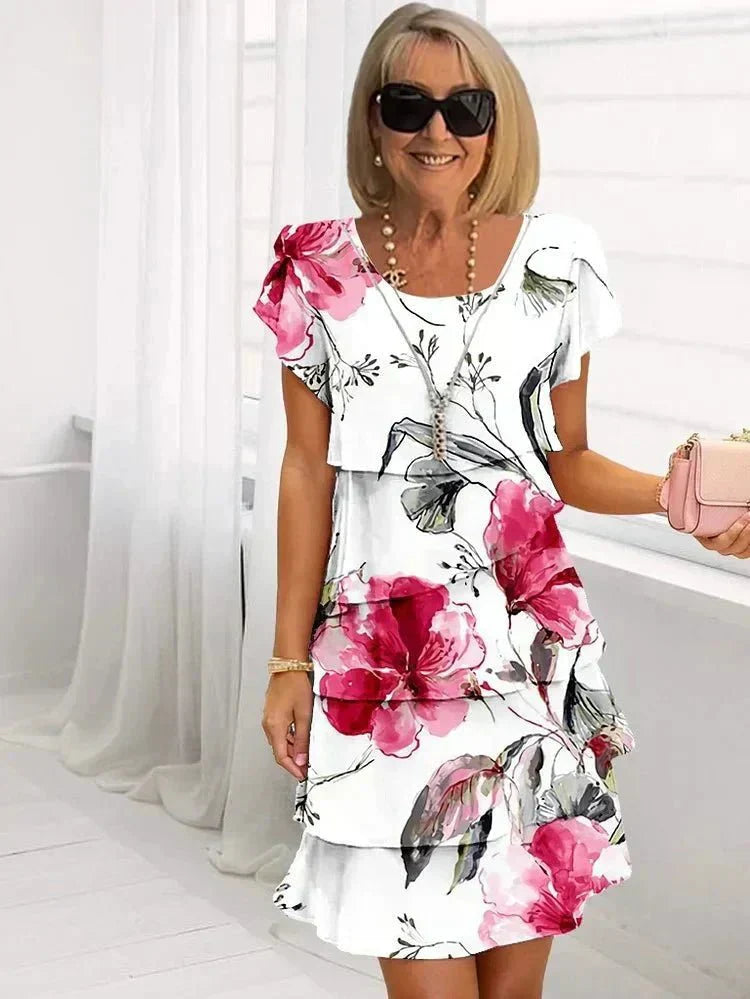 Jenna cascading floral tiered dress with flowing skirt in a soft feminine print