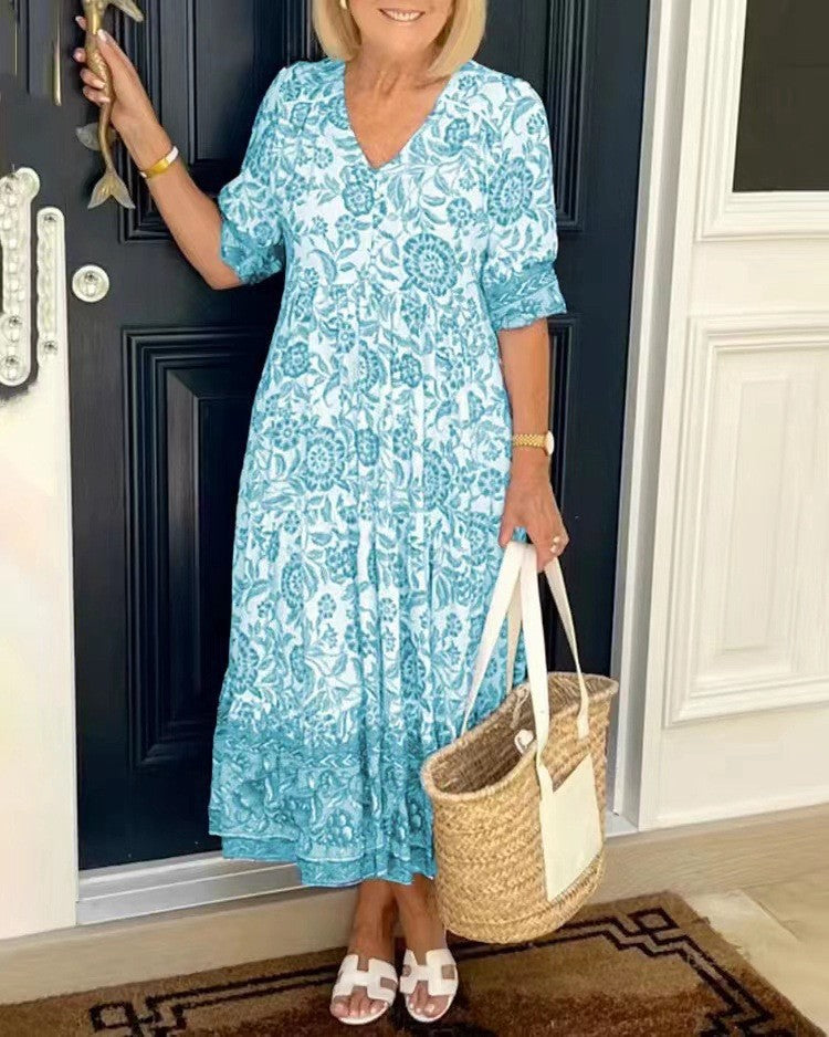 Keisha graceful V-neck floral dress shown in a soft feminine silhouette