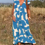 Amelia printed V-neck A-line dress in a flowing silhouette
