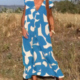 Amelia printed V-neck A-line dress in a flowing silhouette