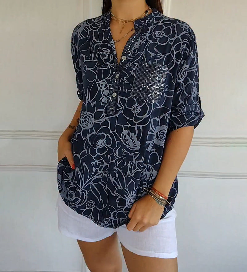 Sade floral print blouse with a relaxed, flowing silhouette in light blue