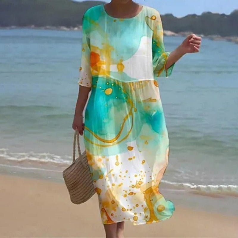 Keely Sunset floral dress in a feminine print, shown in blue floral and green colourways