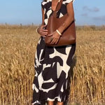 Amelia printed V-neck A-line dress in a flowing silhouette