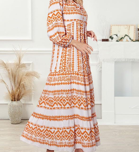 Vanessa boho puff maxi dress with V-neckline, puff sleeves and ruffled A-line hem