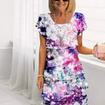 Jenna cascading floral tiered dress with flowing skirt in a soft feminine print