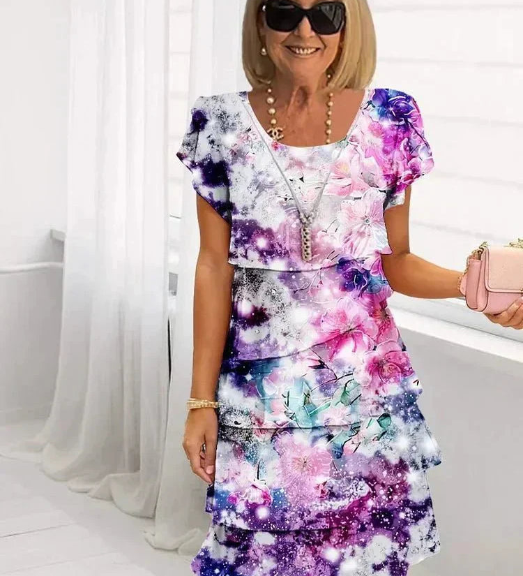 Jenna cascading floral tiered dress with flowing skirt in a soft feminine print